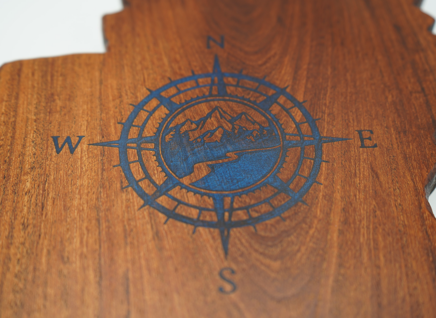 Lake Tahoe Shaped Charcuterie Board With Brilliant Blue resin Compass Design Made From Sapele wood
